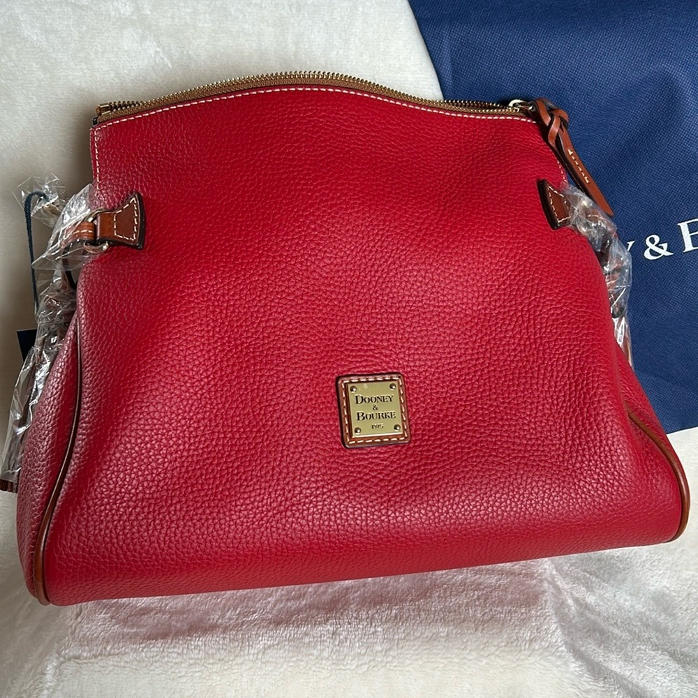 Dooney & Bourke Red pebble leather medium zip crossbody with duster.